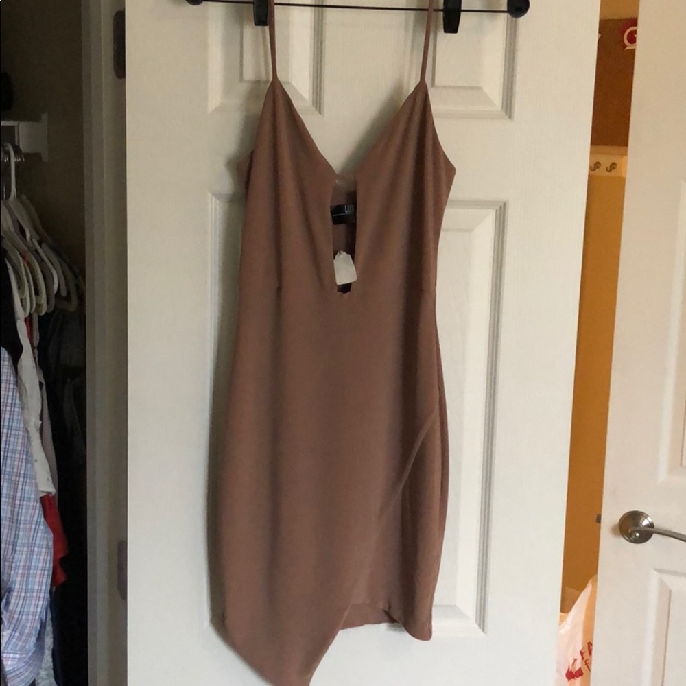 Bodycon nude dress.